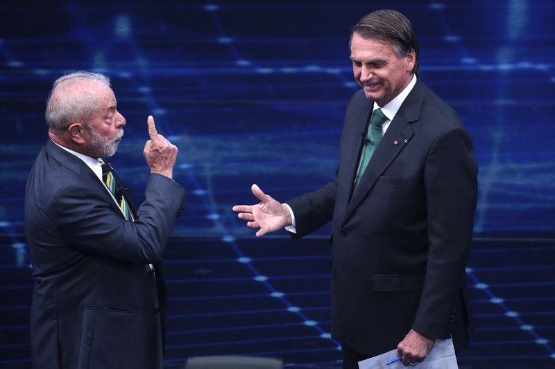 Luis Inácio Lula da Silva og Jair Bolsonaro í kappræðum í kosningabaráttunni. Mynd: EPA